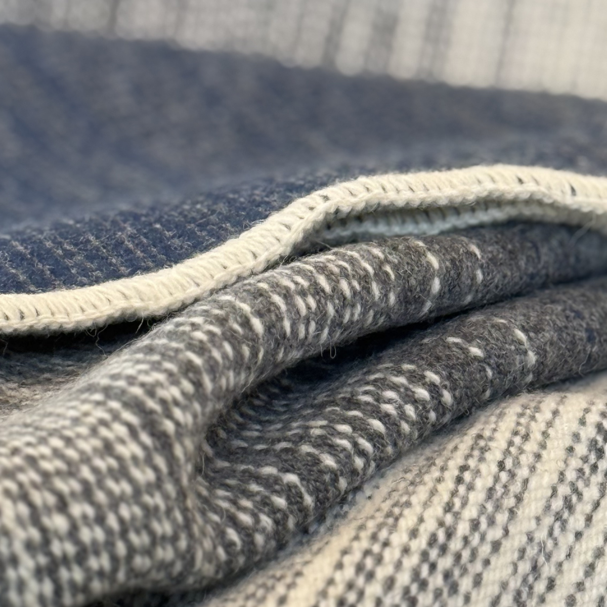 Balme wool throw / ecru-grey-blue